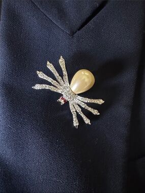 Kenneth Jay Lane Silver-Tone Spider Brooch with Cream Pearl and Red Accent